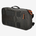 The Cancha Padel & Pickleball Bundle features a black rectangular travel bag with a top handle, multiple black side straps, and eye-catching orange zipper pulls. This practical wet-dry bag is photographed against a plain white background.