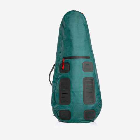 The Cancha Original Racquet Bag (15L) features a green carrying case with black accents and a red zipper pull, designed for a specific elongated shape. This lightweight, water-repellent tennis racquet bag also offers customizable add-ons for enhanced functionality.